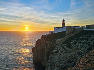 Lighthouse Cabo Vicente in Sagres Portugal at sunset © Nataraj