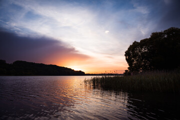 sunset over the lake, kashubia, poland