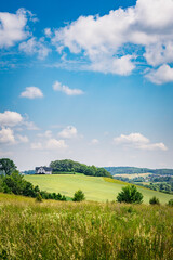 landscape with green field and sky, kashubia, poland