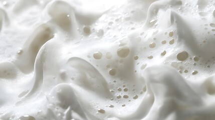 Fototapeta premium Elegant abstract background showcasing soft white foam in glowing motion