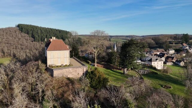 Larochemillay village in Burgundy, France in winter with forests, hills and meadows