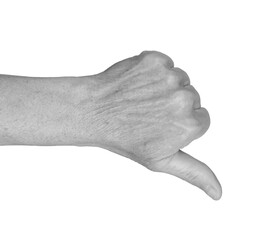Thumbs down gesture. Senior woman s wrinkled hand with thumb pointed downward, symbolizing...