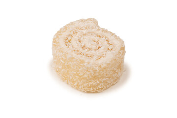 Coconut candy roll isolated on a white background.