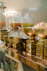 A buffet table full of different types of fish meat and salads at a wedding or party in the hotel restaurant.
