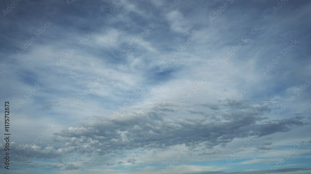 Canvas Prints time lapse of blueish spring clouds moving through a blue sky. only clouds shown