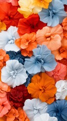 Obraz premium Vibrant Multicolored Paper Flowers Background Colorful Floral Textile Texture Close Up