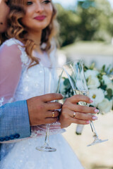 bride and groom holding glasses of champagne