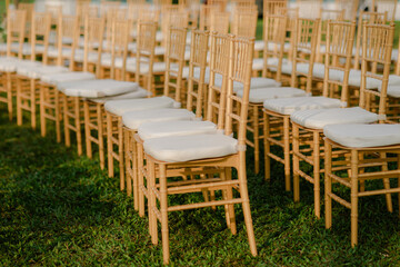 Wedding reception, table setting and celebration event with flower arrangement, decor and catering for a romantic setting. Party, luxury restaurant or fancy place with cutlery