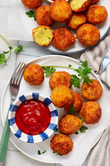 Potato and cheese croquettes with ketchup.top veiw. style rustic