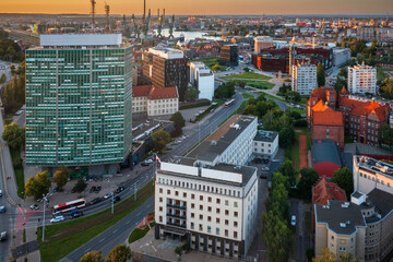 City center of Gdansk with the shipyard area at sunset, Poland. © Patryk Kosmider