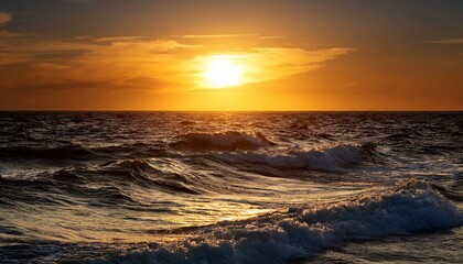 Fototapeta premium golden sunlight reflecting over darkish ocean waves for the duration of sundown