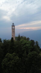 Breathtaking aerial images from the top of the Volta lighthouse on the top of the hill near the city of Como in the light of sunset