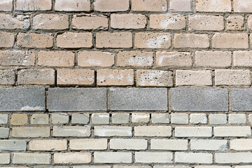the building wall is made of white silicate bricks and cinder blocks. texture for background