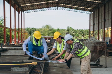 Engineer checking building strength and foundations, showing construction. Worker in construction site.