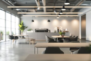 Modern office break room with tables and chairs