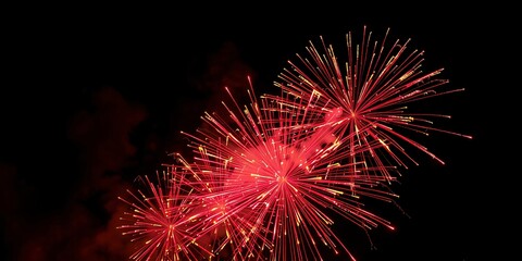 Fototapeta premium Golden Fireworks - Countdown To Midnight - Abstract Defocused Background. 2025 New Year’s Eve Countdown Fireworks