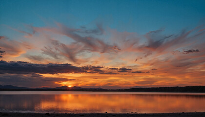 Obraz premium Serene sunset over lake with colorful sky