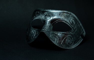 black and silver face mask