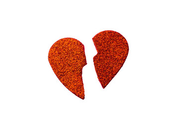 A broken heart split into two halves, with jagged edges, symbolizing heartbreak, sadness, or loss...