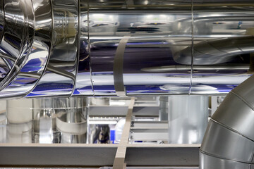 Modern Heating Plant Interior with Steel Pipelines and Advanced Control Systems – Efficient Energy Infrastructure in Industrial Environment.