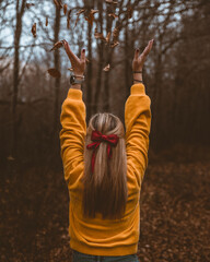 person holding a pumpkin