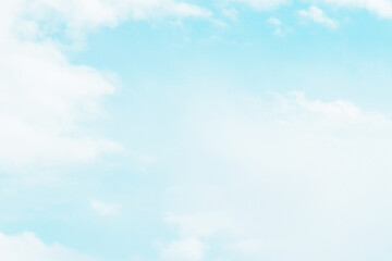 White fluffy cloud with blue sky pastel colour. Soft light summer cloudscape. Freedom of life, never give up and positive though energy concept. 