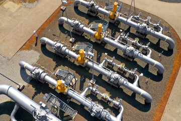 Natural gas pipeline in European Union. High pressure pipes on a hot summer day.
