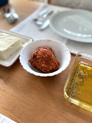 Acuka spicy Turkish appetizer ezme made with tomatoes, bell pepper, parsley, mint, olive oil and hot chili. A kind of adjika.