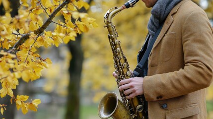 Autumn Saxophone Melodies: Stylish Musician Playing in Fall Park Setting