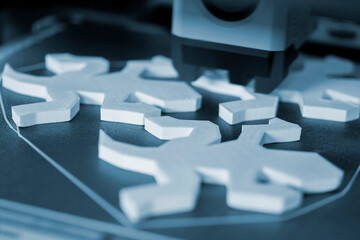 The process of printing on a 3D printer. 3D printer printing object from molten plastic close-up. Creative creation of model on 3D printer. New modern technologies of 3D printing. Additive technology