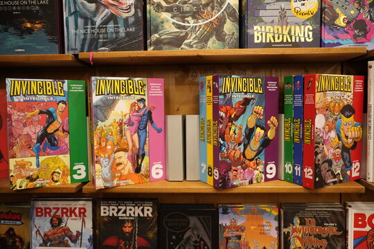 paris, FRance ,12 12 2024 : huge collection of  comics on sale in the bookstore, Invincible