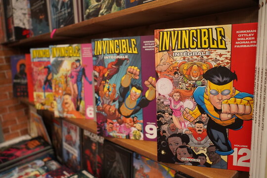 paris, FRance ,12 12 2024 : huge collection of  comics on sale in the bookstore, Invincible