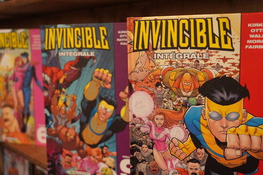 paris, FRance ,12 12 2024 : huge collection of  comics on sale in the bookstore, Invincible