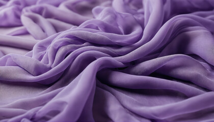 Obraz premium Soft purple fabric draping elegantly across a surface creating gentle waves and folds under soft lighting