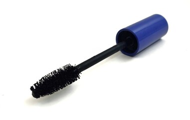 Top view of a mascara applicator with a blue handle and black bristles, isolated on a white background.