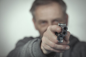 Man take care of two barrel derringer personal handgun caliber .38 special