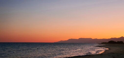 Sunset with beautiful colors by the sea