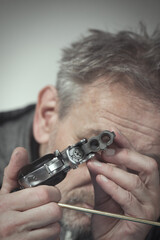 Man take care of two barrel derringer personal handgun caliber .38 special