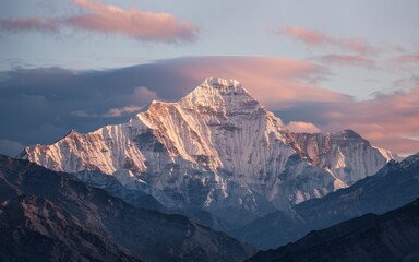 Obraz premium Himalayan Mountains, Majestic snow-capped mountain peak at sunset, dramatic cloudscape.