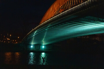 Troja Bridge is a road and tram steel arch bridge across the Vltava River in Prague.