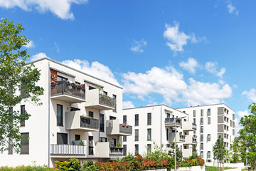 Cityscape of a residential area with modern sustainable apartment buildings, new green urban landscape in the city