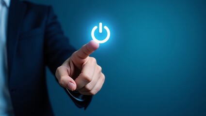 Hand pressing digital power button on blue gradient background
