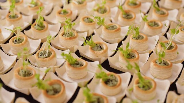 catering snacks with puff pastry and guacamole