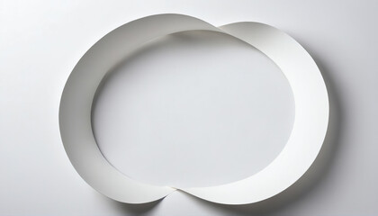 Creative paper design featuring an elegant, flowing shape on a minimalist background
