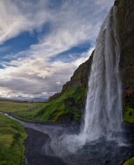 Seljalandsfoss waterfall summer 2024 at sunset including Glj&uacute;frab&uacute;i falls off Ring Road Iceland, Scandinavia, Europe.