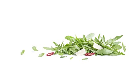 A salad with roasted red peppers, arugula, and shaved Parmesan cheese, isolated on a white background