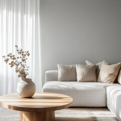 A white couch with a vase of flowers on a wooden coffee table