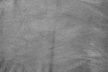 Gray suede leather macro photo as background material for designers.