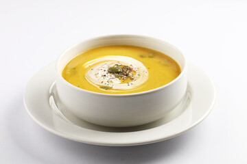 Pumpkin soup. Vegetarian soup with pumpkin seeds in ceramic bowl
