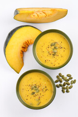 Pumpkin soup. Vegetarian soup with pumpkin seeds in ceramic bowl